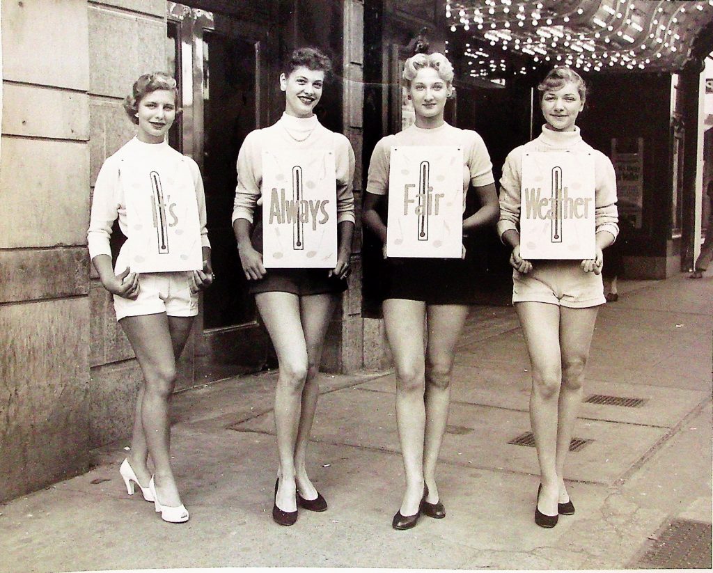 Promoting the 1955 musical film It’s Always Fair Weather, these cheerful ushers embody the lively spirit of Shea’s during its heyday. 