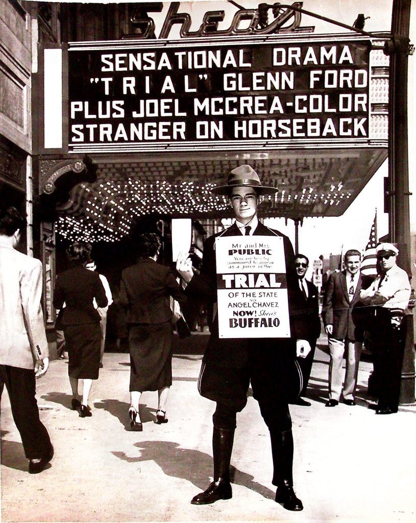 Promoting the courtroom drama Trial, Shea's Buffalo used street marketing stunts, like this character in a mock juror's outfit, inviting passersby to experience the suspense as part of the 'public jury.'