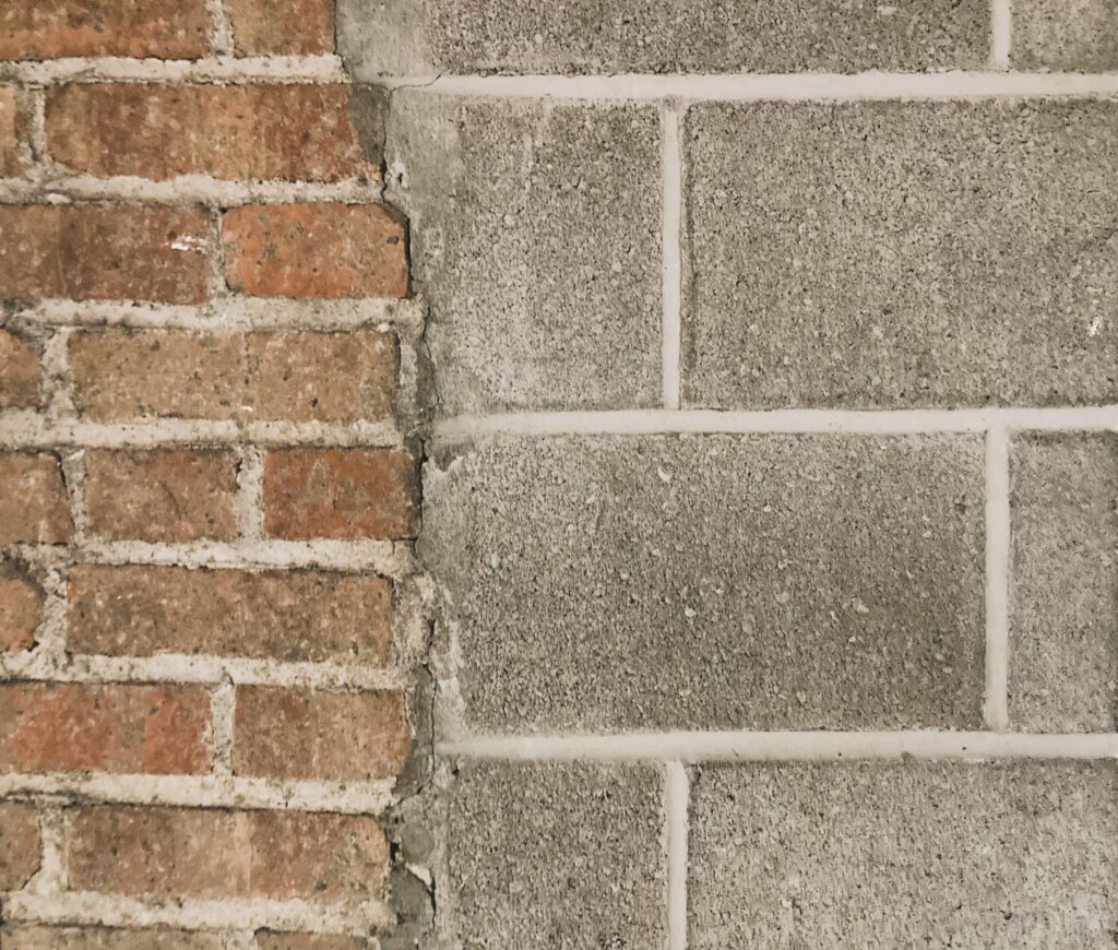 You can see the divide between the original stagehouse and the expansion depicted here - the original 1926 brick juts against the 1999 cement block addition.