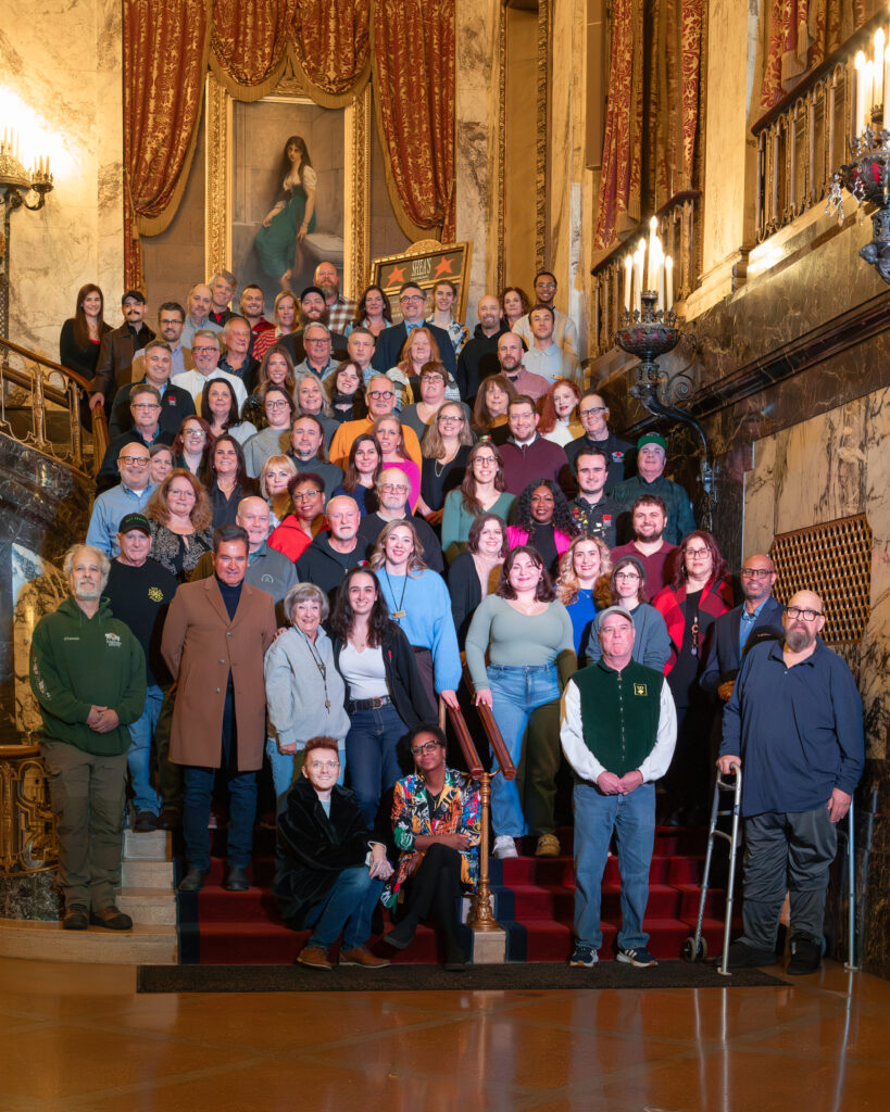 Shea's staff photo for a new century.